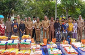Pj. Bupati OKI Serahkan Bantuan Untuk Korban Kebakaran di Srinanti