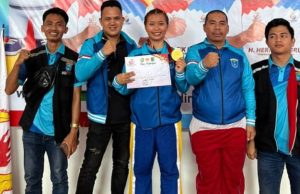 Kickboxing OKI Cetak Sejarah, Atlet Muda Putri Saskia Raih Emas Perdana
