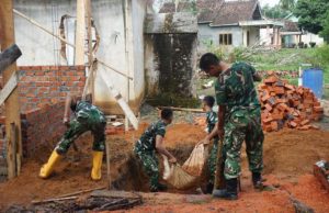 TMMD Ke-128 Kodim 0402/OKI Kebutan Pembangunan MCK di Pematang Sukatani
